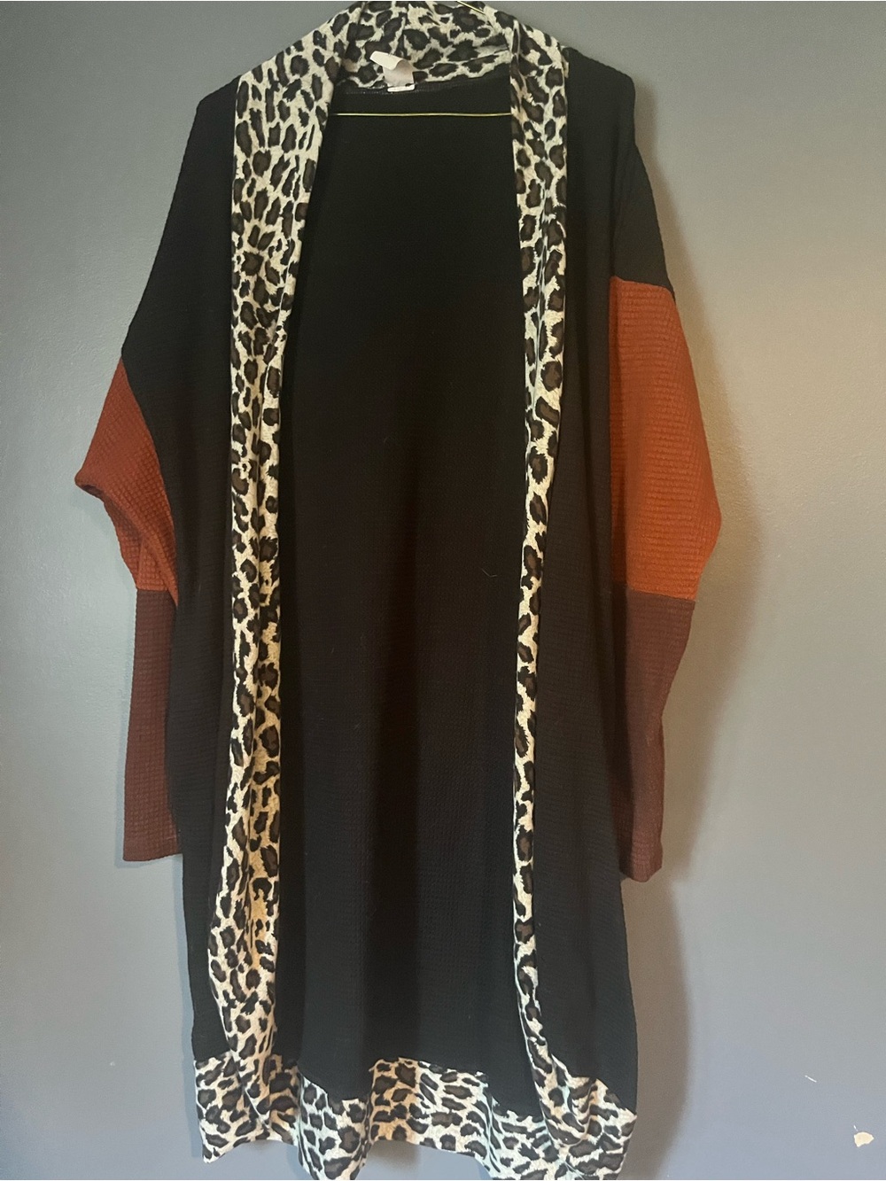 Open-Front Black Cardigan Coat with Rust Sleeves and Leopard Trim